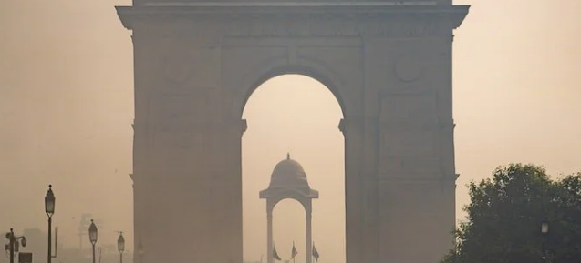 Delhi artificial rain failed experiment photo showing aircraft spraying clouds